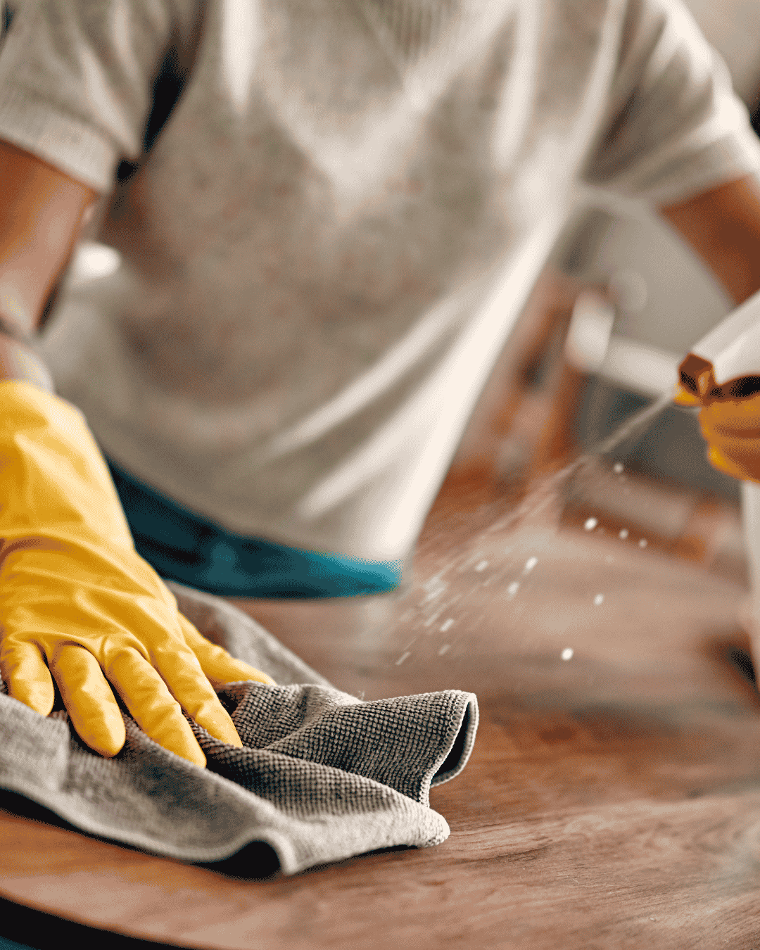 Student cleaning a home
