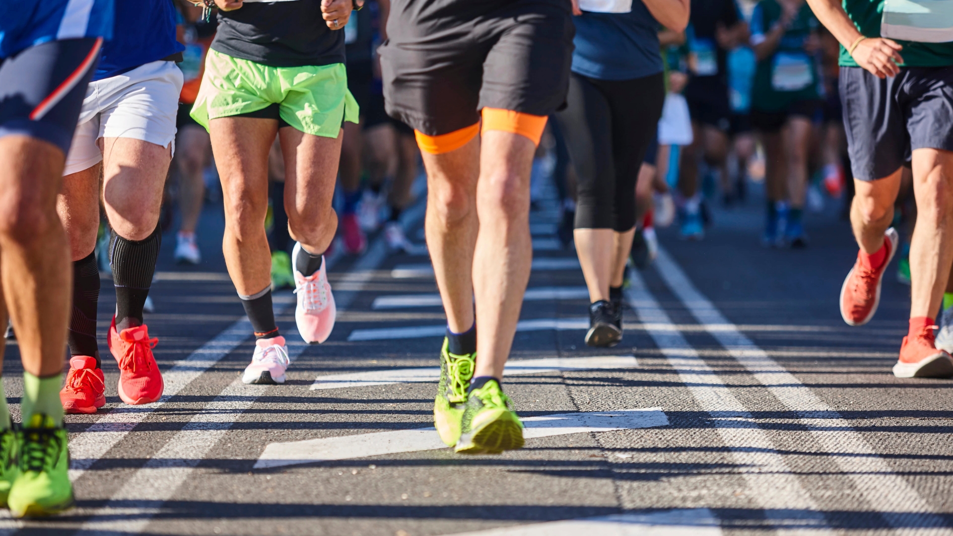 Runners crossing the start line